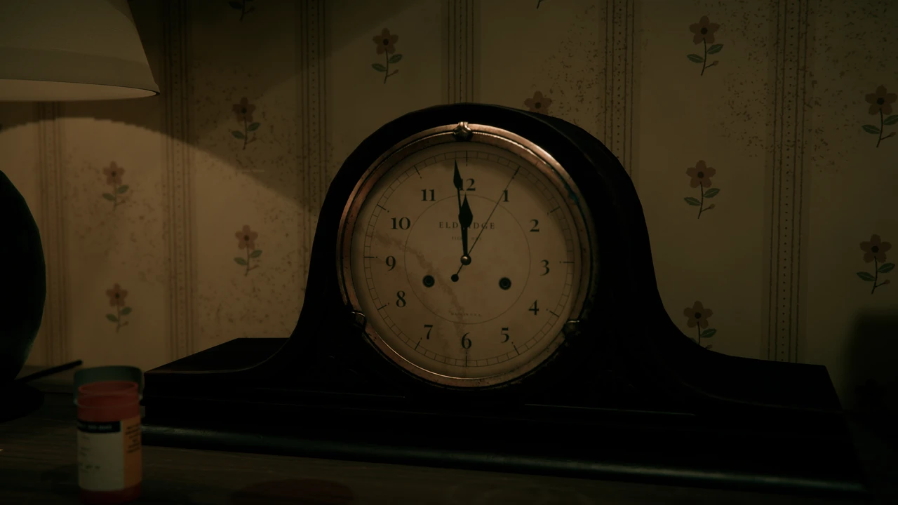 A mantel clock on a dresser showing one minute to twelve, a pill bottle in the foreground, floral wallpaper behind it.